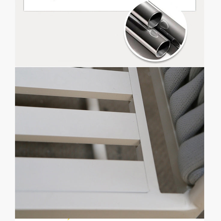 Close-up of a white metal frame with a small inset showing a metallic tube.