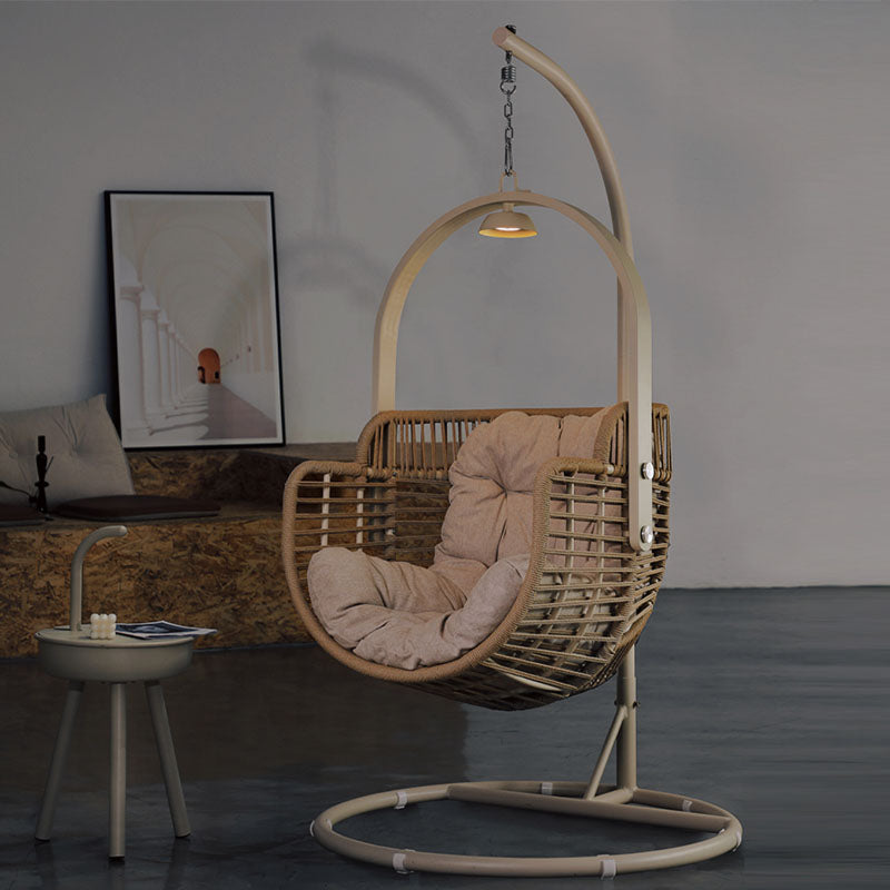 Hanging wicker chair with cushions in a modern interior setting  | Extraordinary Emporium UK