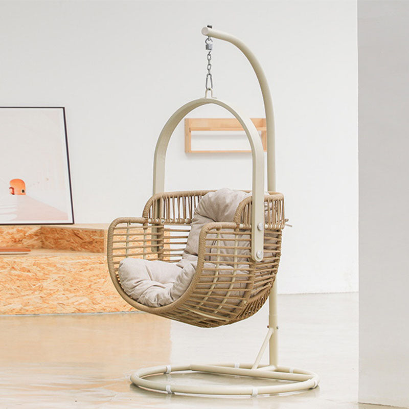 Wicker baby swing with a cushion on a white background  | Extraordinary Emporium UK