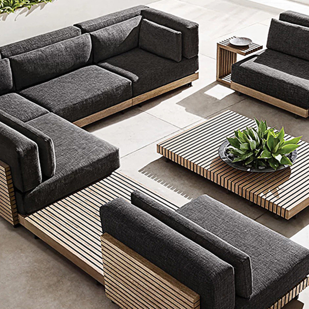 Modern outdoor furniture set with gray sofas and a wooden coffee table. | Extraordinary Emporium UK