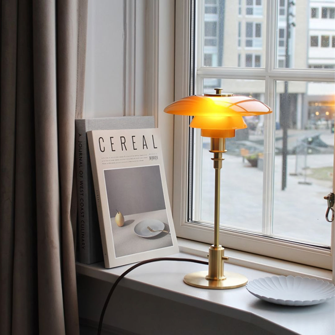 Brass table lamp on a windowsill  | Extraordinary Emporium UK
