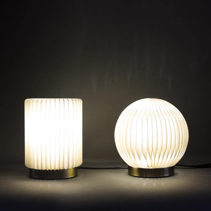 Two table lamps with ribbed design on a dark background | Extraordinary Emporium