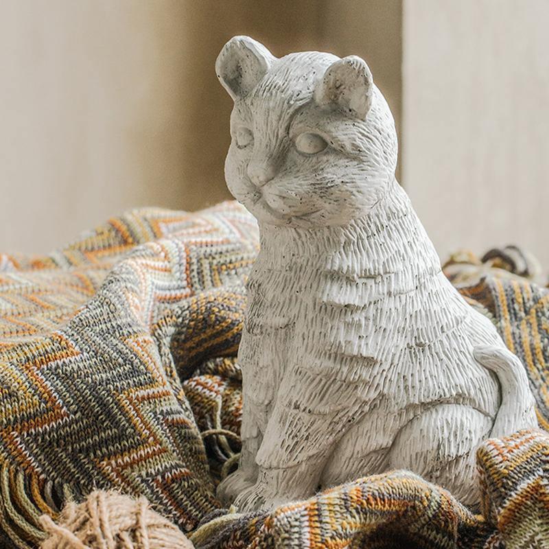 Statue of a cat sitting on a textured fabric background  | Extraordinary Emporium UK