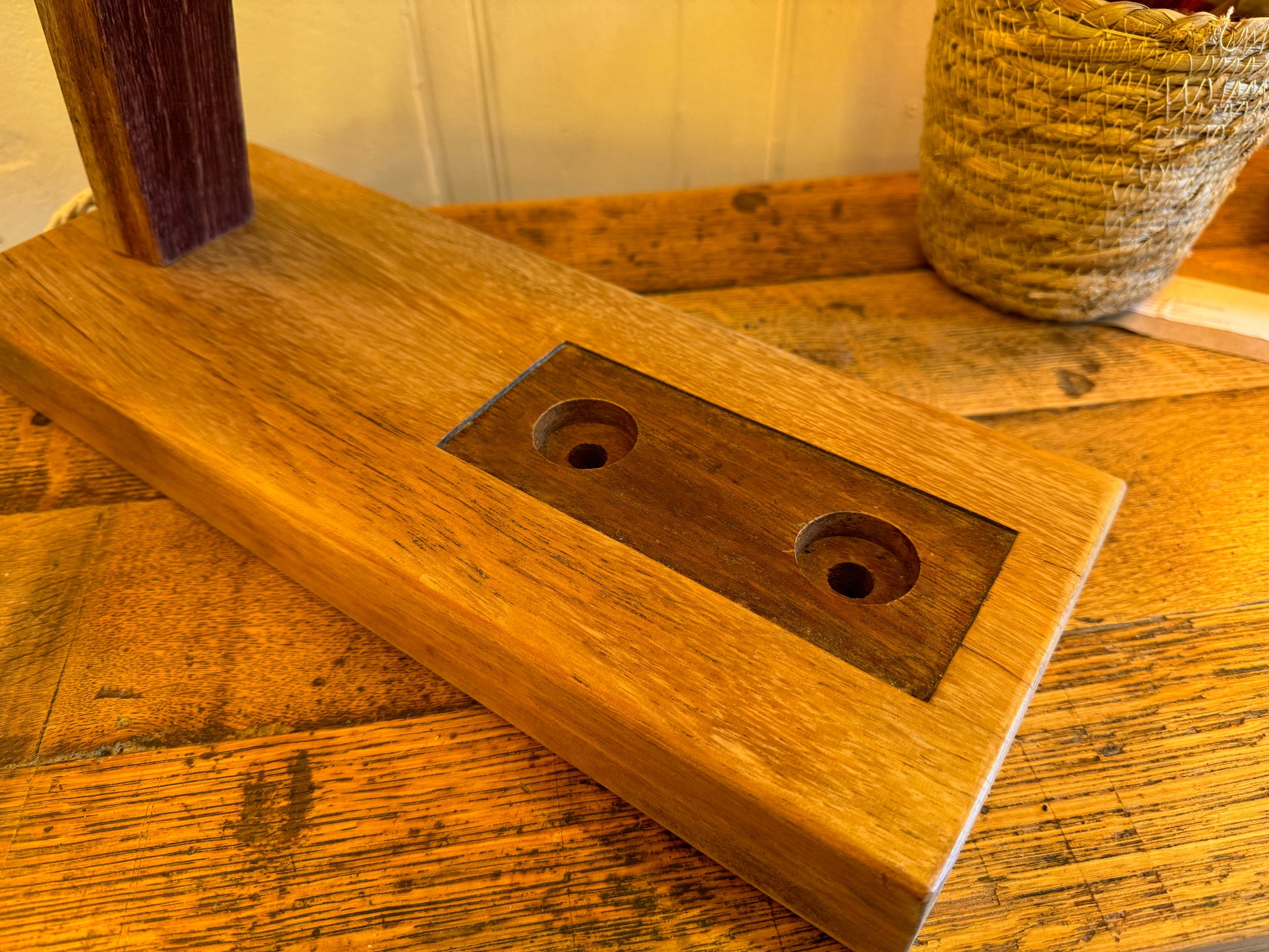 Wooden surface with a metal bracket on a wooden table| Extraordinary Emporium 