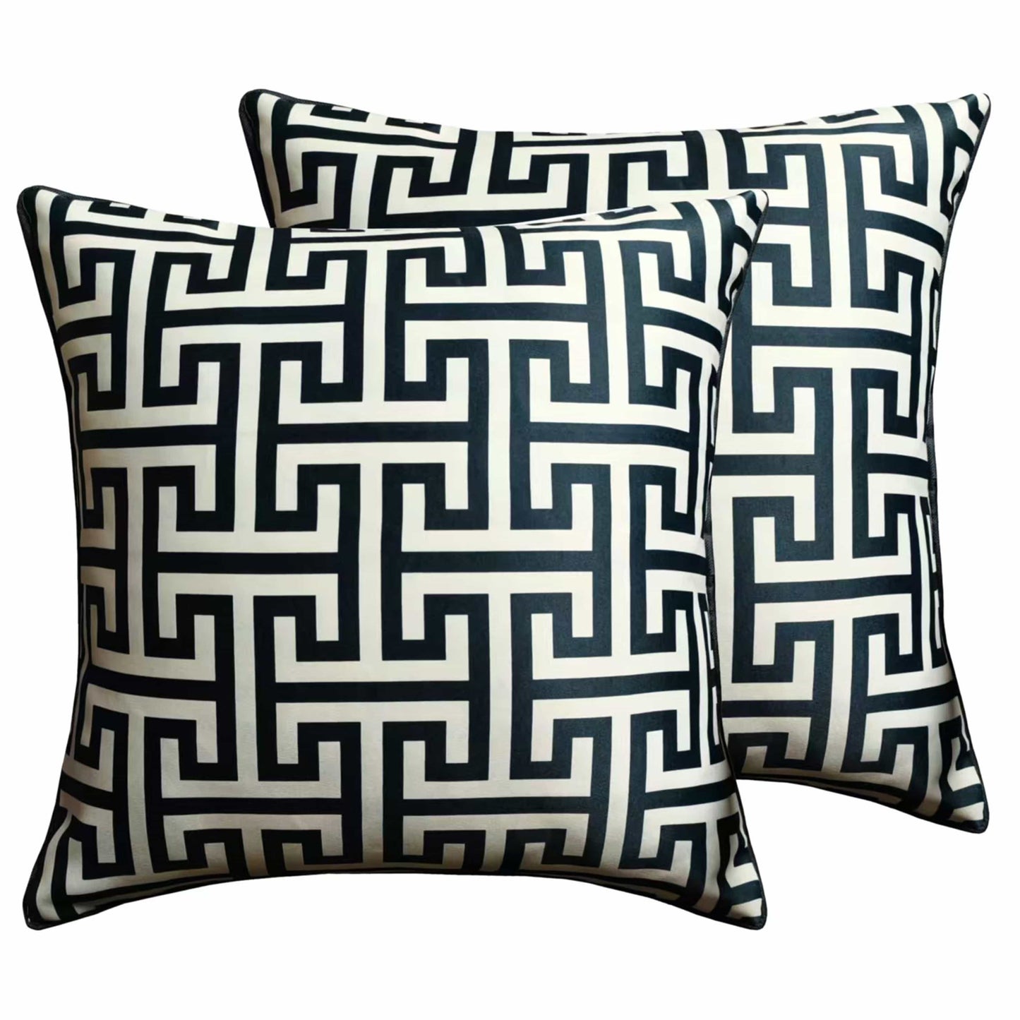 Two decorative pillows with a geometric pattern on a white background Decorative pillows with geometric patterns and Olivia Rocco branding on a white background | Extraordinary Emporium UK